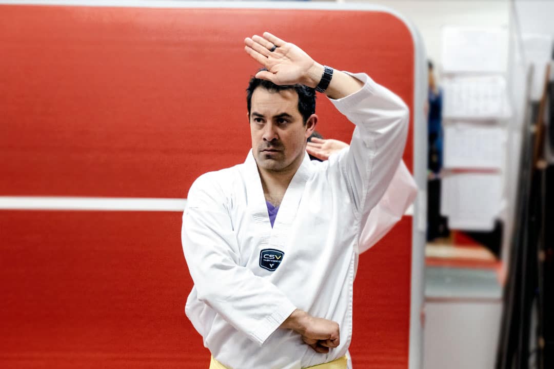 Adult martial arts student practicing traditional Taekwondo technique at ABBA Martial Arts in Peachtree City
