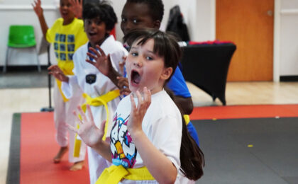 Children practicing Taekwondo with energy and confidence – supporting emotional recovery after bullying | Peachtree City martial arts school