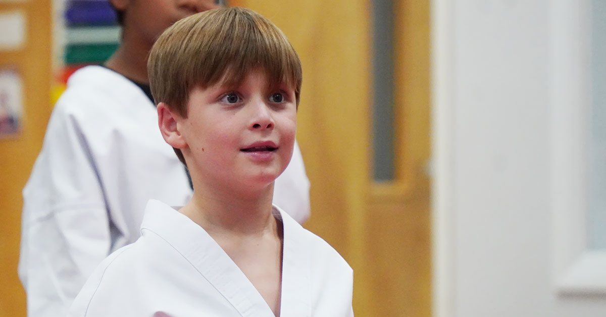 Children improving strength, coordination, and discipline through Taekwondo training.