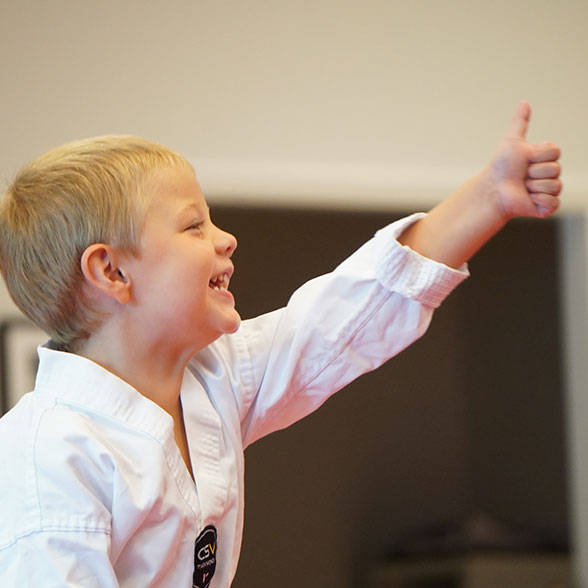 happy kid showing thumb up