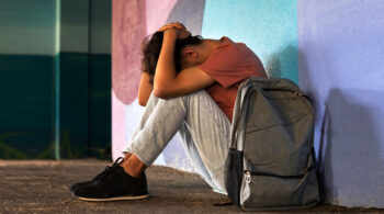 Parent comforting a child who is being bullied at school - What to Do If Your Child Is Being Bullied: A Parent’s Guide